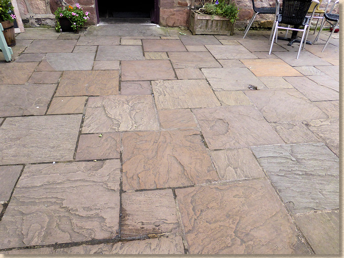 dutch pattern riven sandstone paving